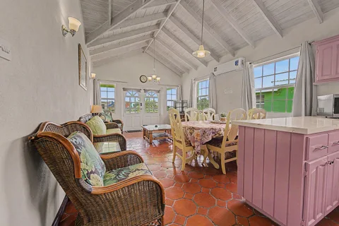 Open-plan living and dining space at Best E Villas