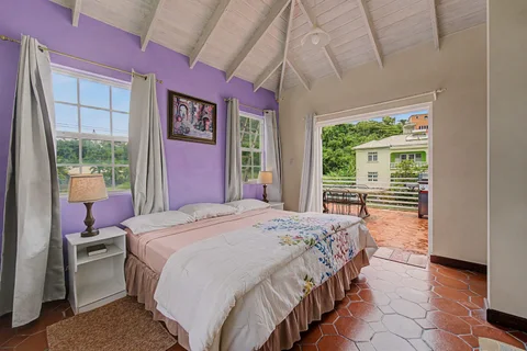 Double bedroom opening onto a terrace in the three-bedroom Prospect villa