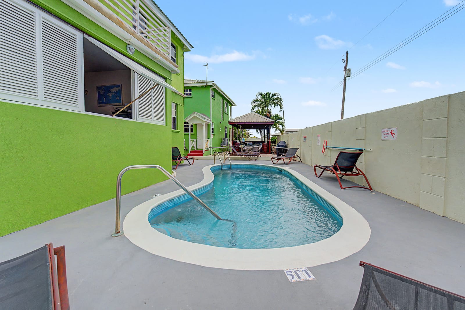 Shared pool and outdoor seating at the Prospect apartments
