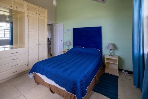 Bedroom with wardrobe at Providence Terrace