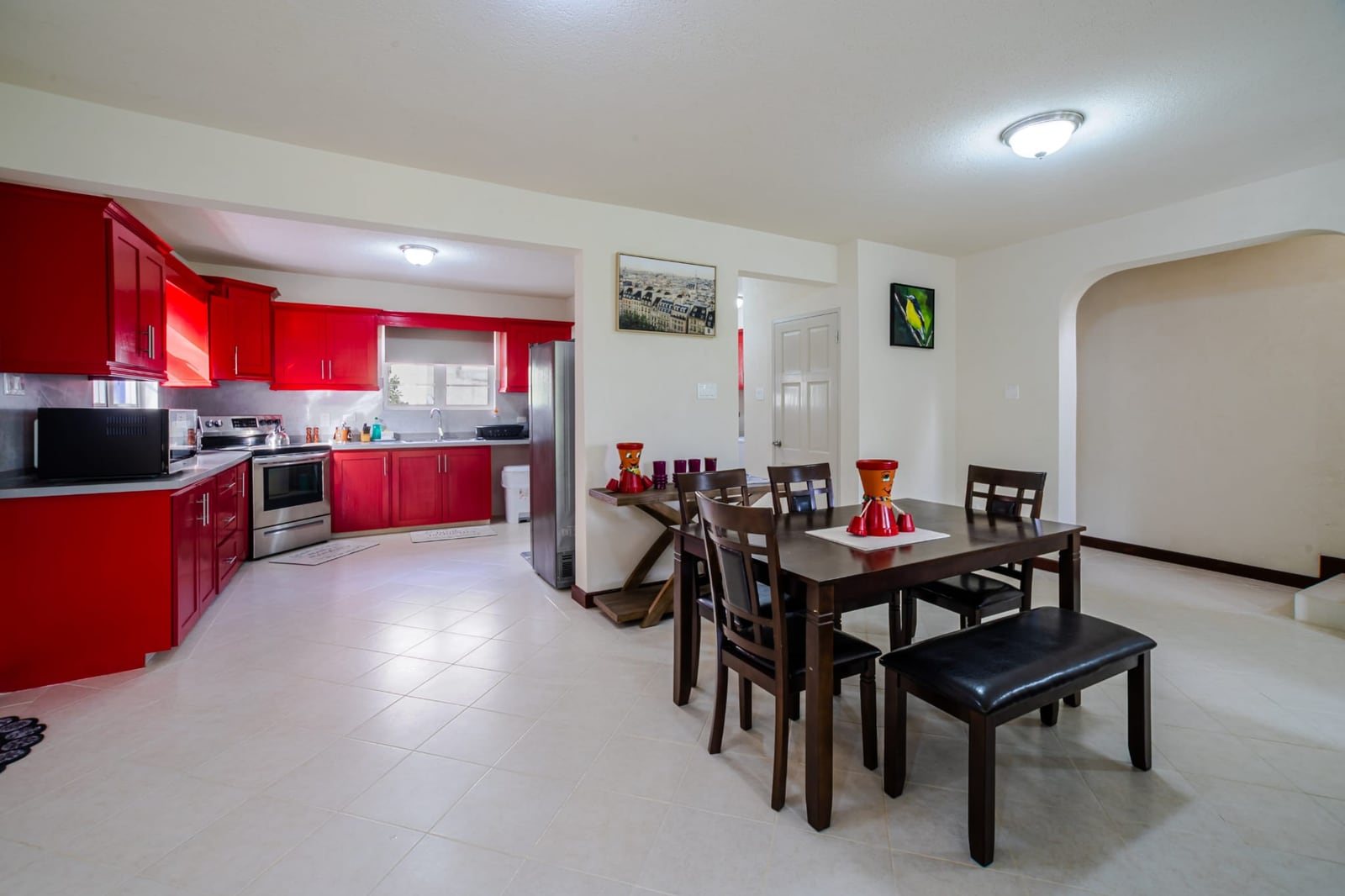 Dining area and red kitchen at the St. Silas villas